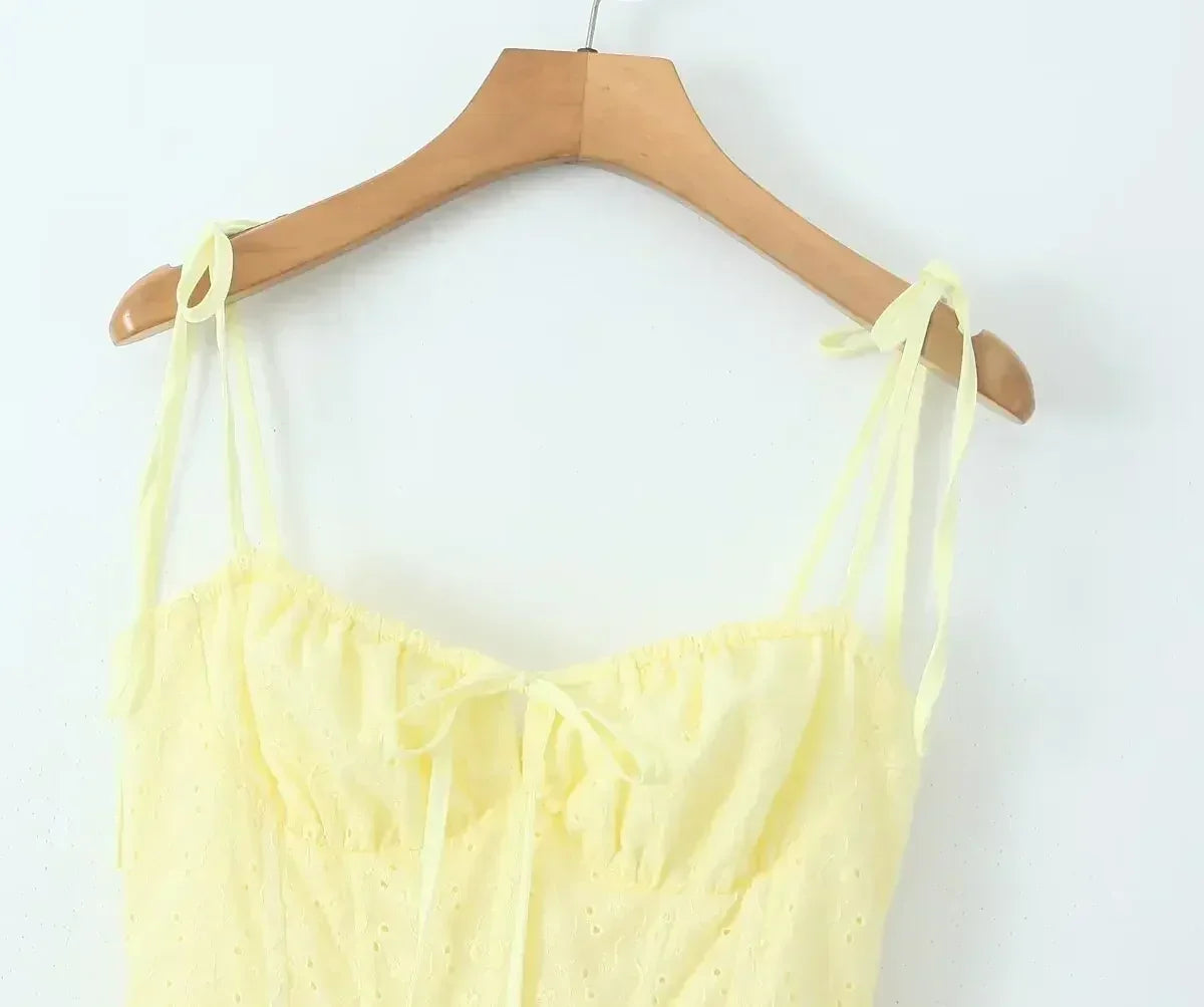 YENKYE Sexy Elegant Women Hollow Out Embroidery Yellow Sling Mini Dress Low Waist Lace Up Bandage Party Dresses Birthday Robe