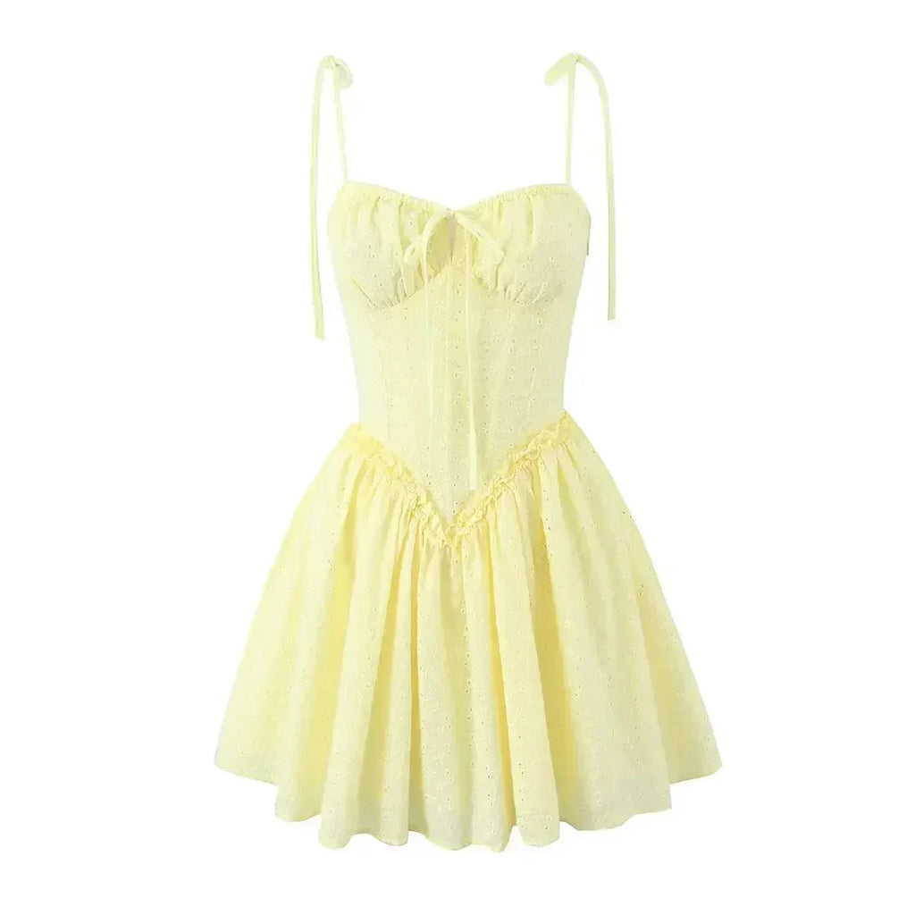 YENKYE Sexy Elegant Women Hollow Out Embroidery Yellow Sling Mini Dress Low Waist Lace Up Bandage Party Dresses Birthday Robe